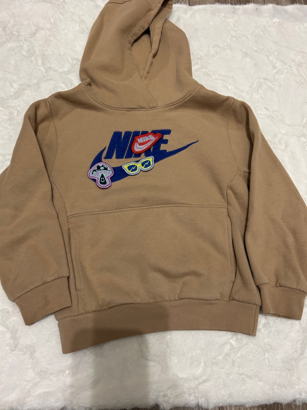 Nike Kids Tan Hoodie with Blue Graphic Swoosh and Patches